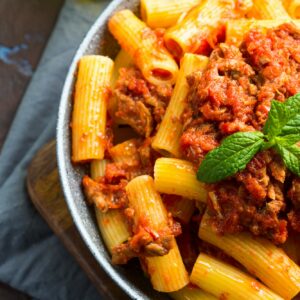 Delicious rigatoni pasta with tomato meat ragu